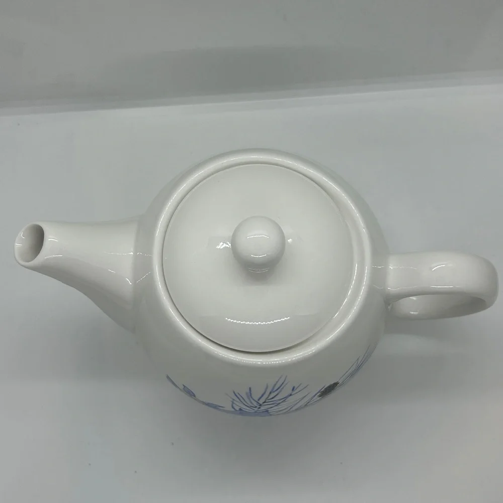 Designpac, Inc. Ceramic Blue Floral Tea Pot with Lid Melrose Park, Illinois